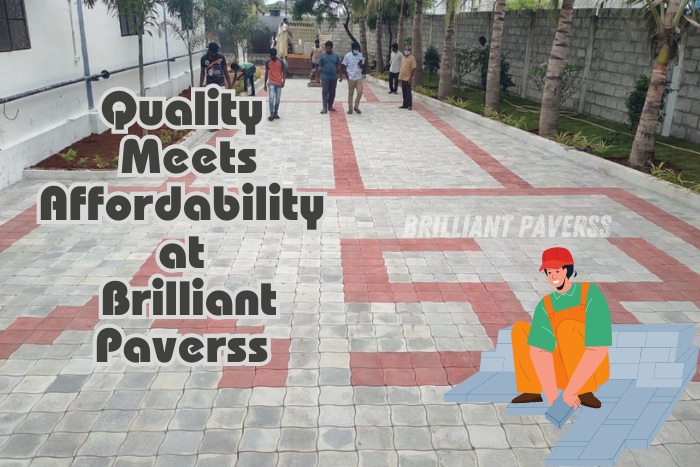 Wide pathway featuring gray and red paver blocks arranged in a geometric pattern, with the text "Quality Meets Affordability at Brilliant Paverss," accompanied by an illustration of a worker stacking pavers, showcasing Brilliant Paverss' high-quality yet budget-friendly paving solutions in Coimbatore