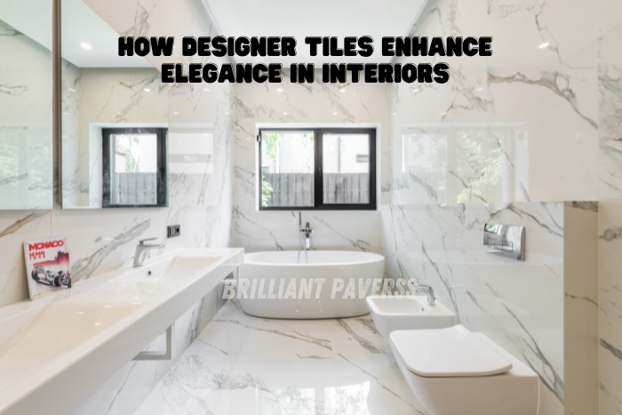 Luxurious bathroom with marble effect designer tiles by Brilliant Paverss in Coimbatore, enhancing elegance and style in modern interi