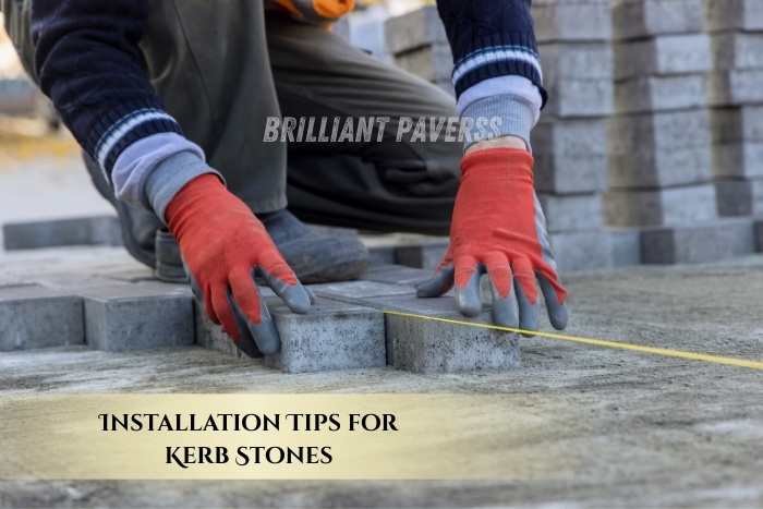 Expert kerb stone installation in progress by Brilliant Paverss team in Coimbatore, ensuring precision for landscaping projects