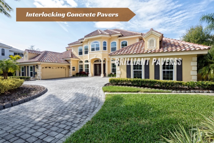 Elegant driveway with interlocking concrete pavers installed by Brilliant Paverss in Coimbatore, enhancing curb appeal and durability